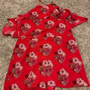 Red flowered halter top romper. New w/tags